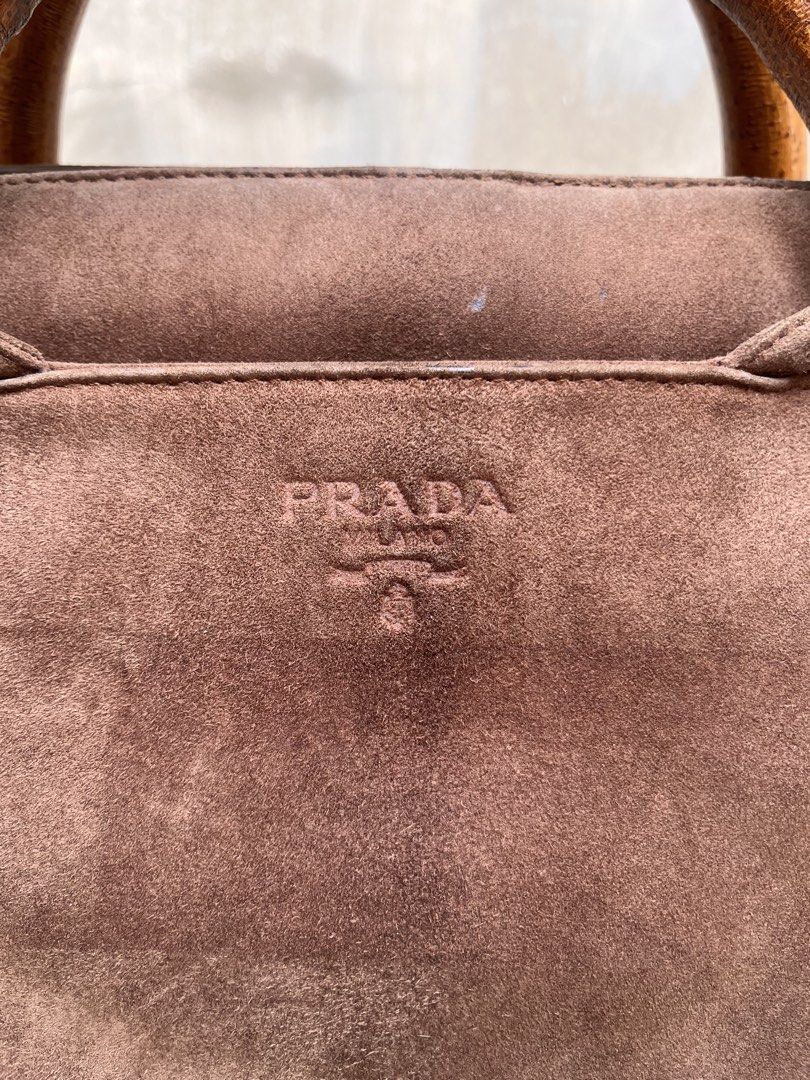 Prada Vintage Suede Wood Handbag (Category: Luxury Bags & Wallets) located in Caloocan City. Submitted by thon0806 (Listing ID 1456447433, Image 2). Description: bag is in good condition need lang ipa bag spa slouchy din suede nya kaya nagsak tignan.