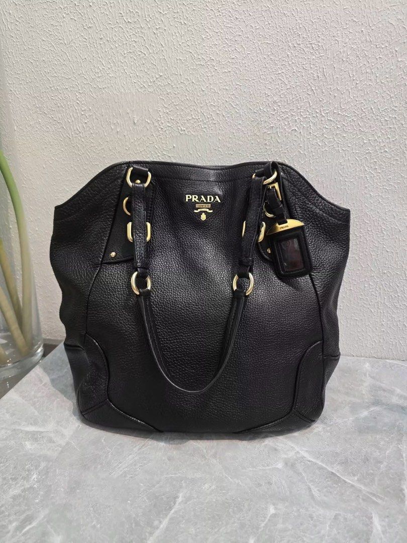 Prada Vitello Daino Shoulder Bag Authentic💯 (Category: Luxury Bags & Wallets) located in Davao. Submitted by preloveditems21davao (Listing ID 1456481612, Image 2). Description: Large size Can fit A4 folder & 14” inches laptop 💻 With Prada dustbag.