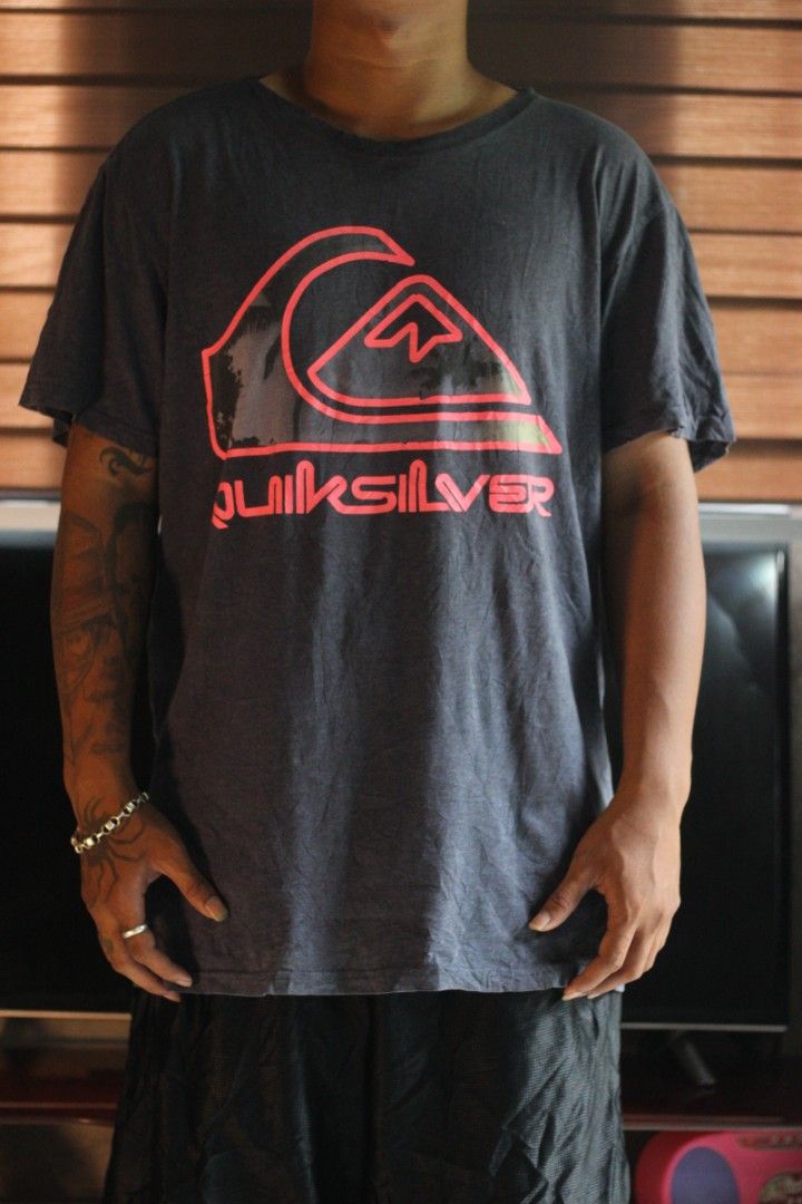 Quick silver t-shirt (Category: Activewear) located in Calabanga. Submitted by foxsthrift_420 (Listing ID 1456542005, Image 1). Description: size large need wash/damage on print good condition dm/pm.