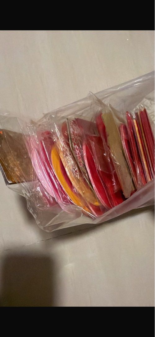 Red packets (Category: Occasions & Party Supplies) located in Singapore. Submitted by blushbunnydoll (Listing ID 1456439844, Image 1). Description: - Various designs and colors (mostly red, some pink & gold) - Perfect for Chinese New Year, weddings, and special occasions - Ample supply for all your gifting needs.