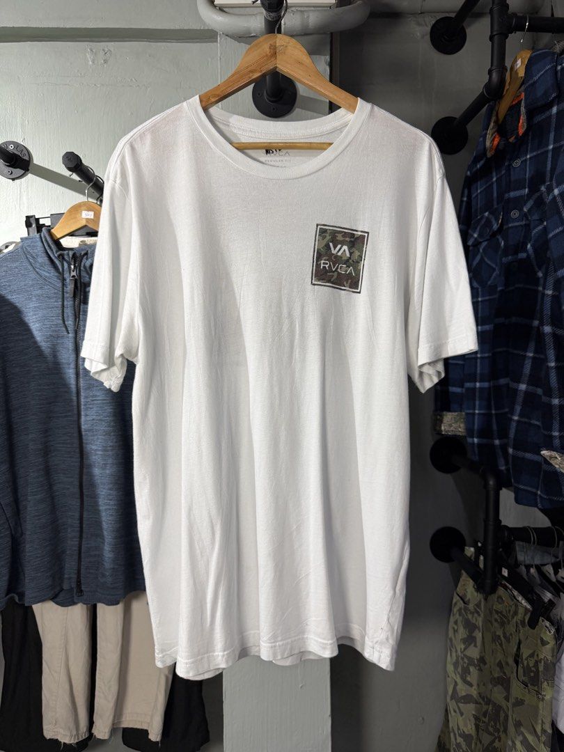 RVCA White T-Shirt with Camo Logo (Category: Tshirts & Polo Shirts ) located in Calamba. Submitted by rummaged.ph (Listing ID 1456521189, Image 2). Description: RVCA Size: Large Width: 21.5” Length: 29” Condition: 9.5/10 Need wash MS193.