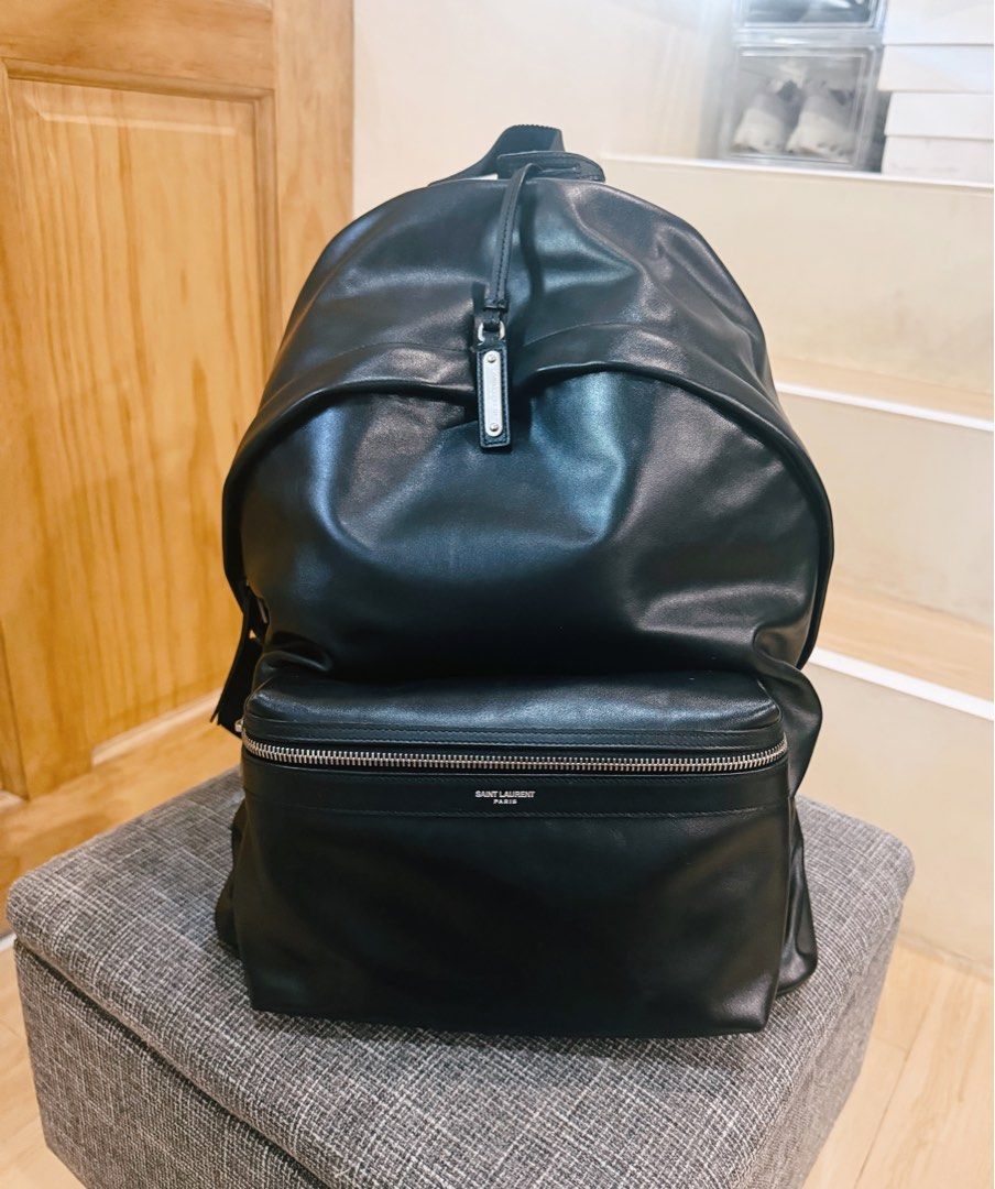 Saint Laurent City Backpack Matte Leather (Category: Luxury Bags & Wallets) located in Davao. Submitted by goodstuff.149 (Listing ID 1456509985, Image 1). Description: BACKPACK MADE WITH METAL-FREE TANNED LEATHER, FEATURING A SAINT LAURENT SIGNATURE EMBOSSED EXTERIOR ZIP POCKET, ZIP COMPARTMENT AND PADDED SLOT POCKET. CHROME FREE AND METAL FREE TANNED LEATHER DIMENSIONS: 31 X 41 X 22 CM / 12.2 X 16.1 X 8.6 INCHES DOUBLE ZIP CLOSURE OXIDIZED NICKE
