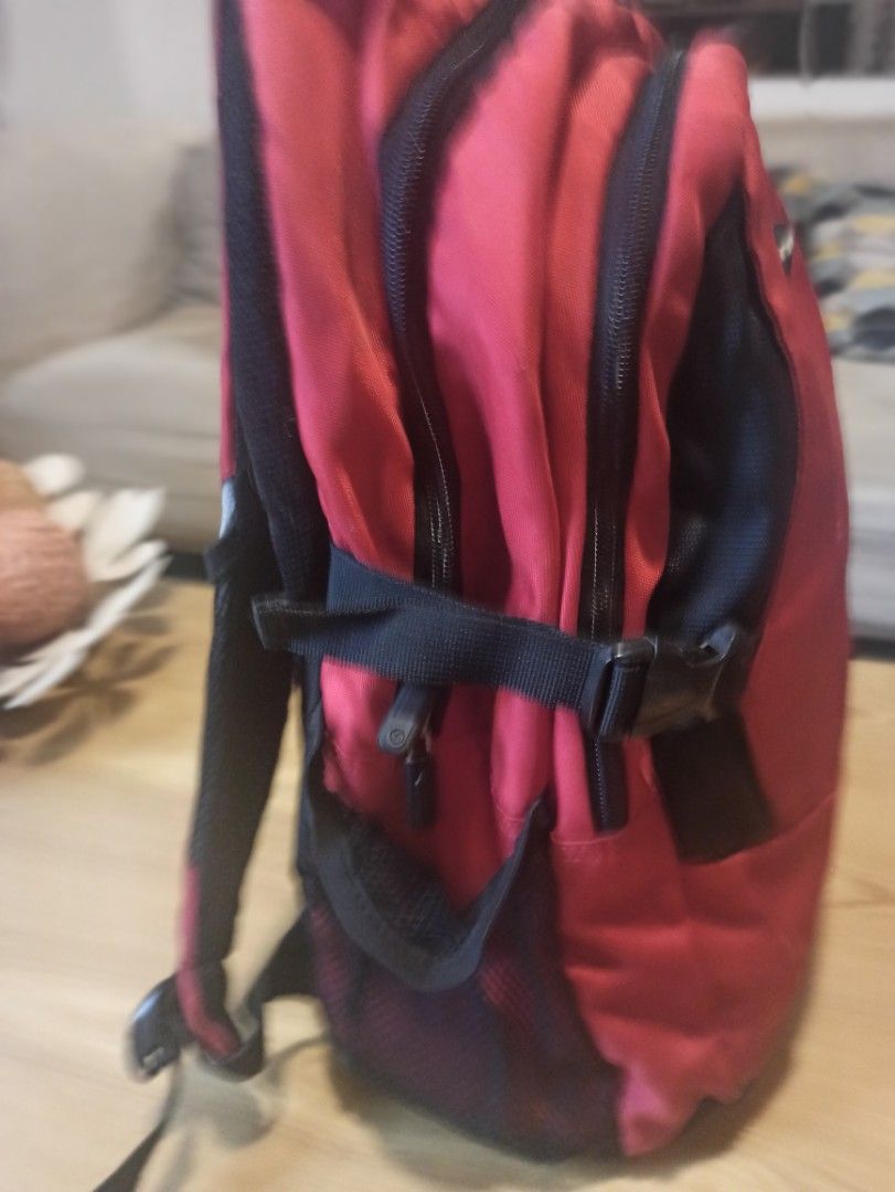 Samsonite Red Backpack - Original bought in KSA (Category: Backpacks) located in Caloocan City. Submitted by rtarellano (Listing ID 1456496179, Image 3). Description: - Red Samsonite backpack with black accents - Multiple zippered compartments for organized storage - Convenient side mesh pocket - Comfortable padded shoulder straps - Ample interior space - Perfect for school, work, or travel.