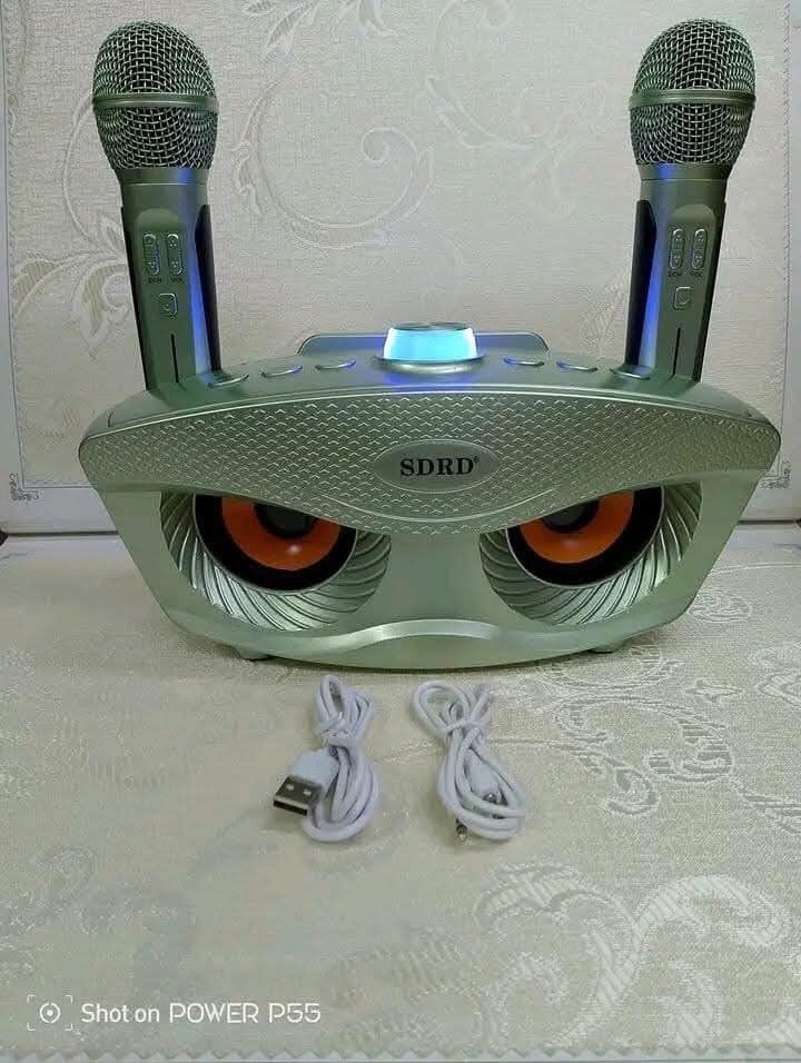 SDRD SD-306 Bluetooth Speaker with 2 Wireless Rechargeable Mics (Category: Soundbars, Speakers & Amplifiers) located in Manila. Submitted by chaionlineshop (Listing ID 1456501475, Image 3). Description: - Portable Karaoke Machine - Connects via Bluetooth, USB, or AUX - Includes 2 Wireless Rechargeable Microphones - Ideal for Parties & Singing Along - Available in Multiple Colors - Easy to Use & Fun for Everyone.