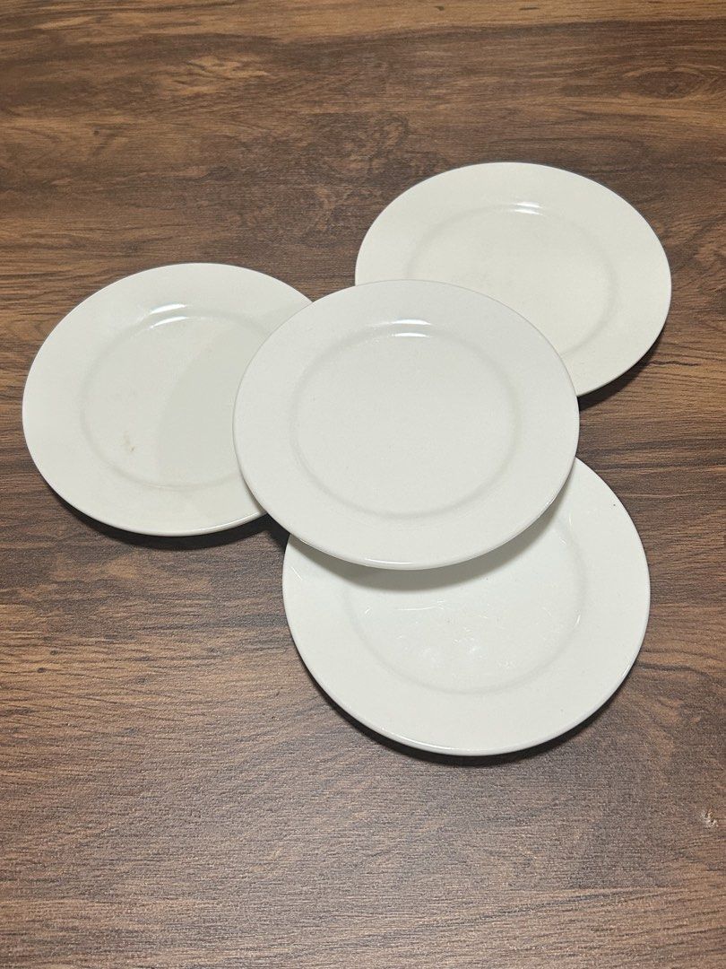 Set of 4 White Ceramic Dinner Plates (Category: Dinnerware & Cutlery) located in Manila. Submitted by silverhawk.069da5 (Listing ID 1456466438, Image 1). Description: - Set of 4 white ceramic plates - Simple and classic design - Ideal for everyday meals or special occasions - Clean and well-maintained.