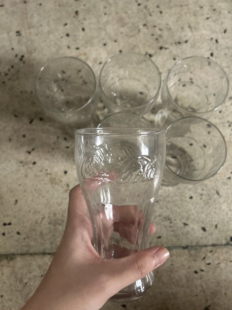 Set of 6 Coca-Cola Glasses (Category: Coffee & Tea Tableware) located in Manila. Submitted by silverhawk.069da5 (Listing ID 1456462510, Image 2). Description: - Set of 6 Coca-Cola glasses - Classic design with embossed logo - Ideal for parties or everyday use - Sturdy and good quality - A great addition to your collection!.