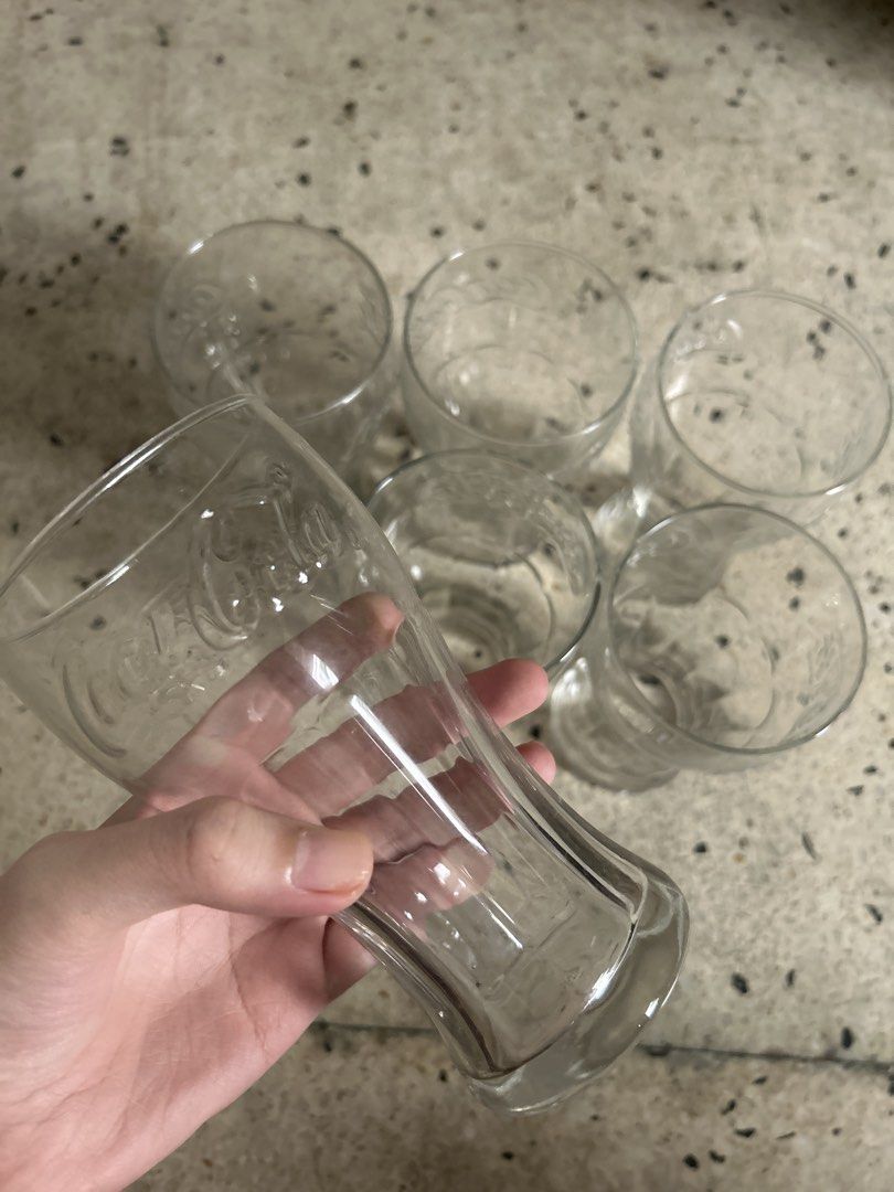 Set of 6 Coca-Cola Glasses (Category: Coffee & Tea Tableware) located in Manila. Submitted by silverhawk.069da5 (Listing ID 1456462510, Image 1). Description: - Set of 6 Coca-Cola glasses - Classic design with embossed logo - Ideal for parties or everyday use - Sturdy and good quality - A great addition to your collection!.