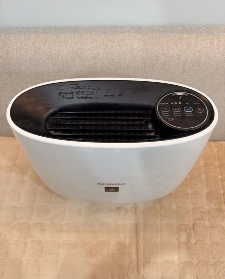 SHARP FP-J30 Air Purifier (Category: Air Purifiers & Dehumidifiers) located in Manila. Submitted by goldenfire.891b0d (Listing ID 1456463494, Image 3). Description: - Sharp FP-J30 Air Purifier - Haze Mode for cleaner air - Timer settings: 4 hours or 8 hours - Filter replacement indicator - Minor scuffs on casing, but works perfectly! Loc: Dasma, Cavite.