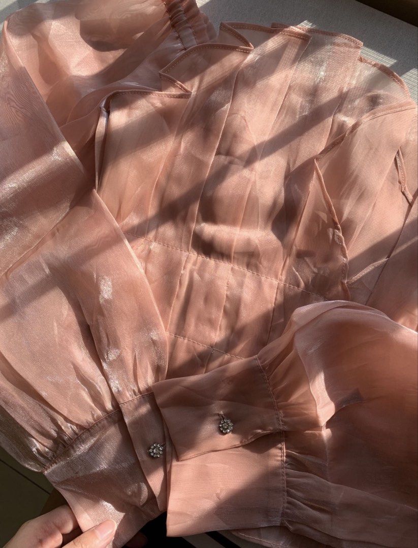 sheer organza fabric off-shoulder top (Category: Others Tops) located in Quezon City. Submitted by buyfromrubyjane (Listing ID 1416094734, Image 3). Description: worn ONCE only! selling the item since im not into off-shoulder tops – can provide actual pictures fit & sizing: 🎀 true to size (model is size small–semi medium) for reference: 32” bust, 26” waistline 🎀 fitted through the bodice 🎀 comfortable stretch at the neckline details: 🎀 off-sh
