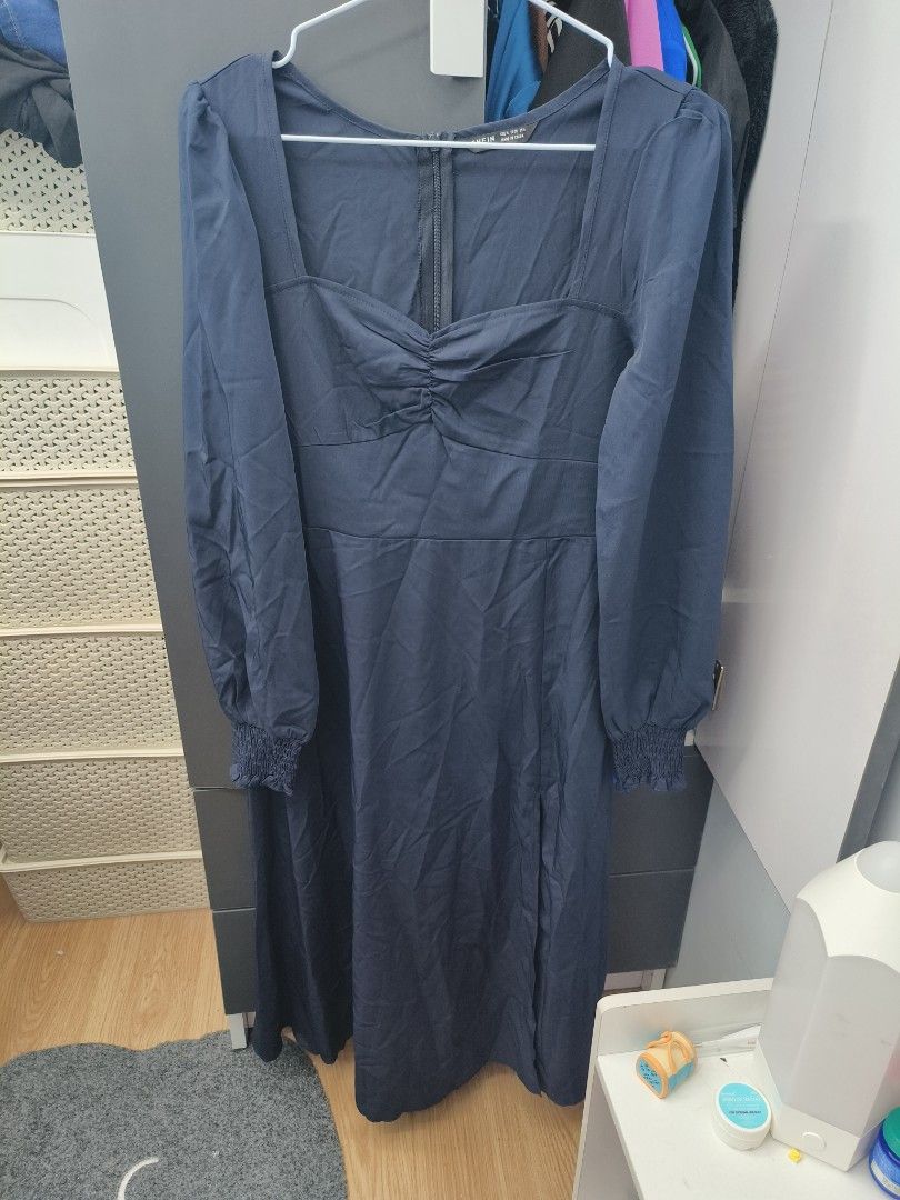 SHEIN Navy Blue Shirred Cuff Split Thigh Dress (Category: Dresses) located in Cavite. Submitted by frombellas (Listing ID 1456580057, Image 3). Description: - Navy blue midi dress - Sweetheart neckline with ruched bust - Long puff sleeves with shirred cuffs - High thigh split - Back zipper closure - Ideal for night outs or special occasions.