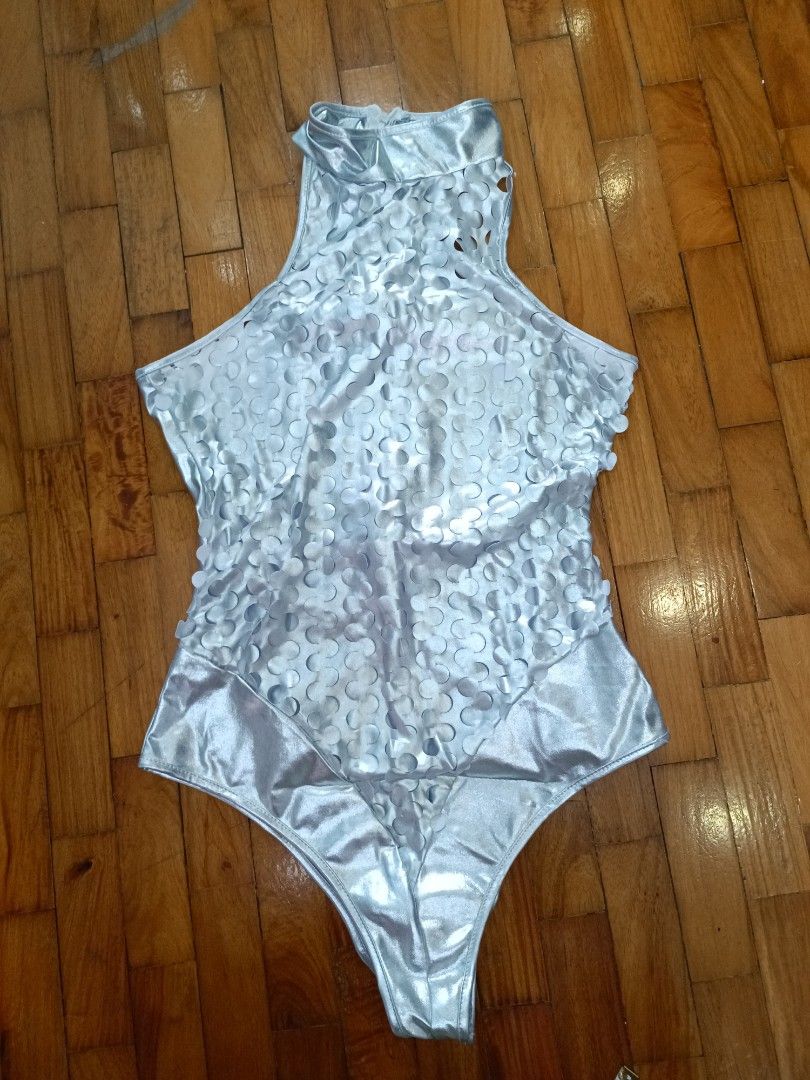 Silver Metallic Sequin Halter Neck Bodysuit (Category: Others Tops) located in Quezon City. Submitted by cheecharon (Listing ID 1456433260, Image 2). Description: - Sparkly silver halter neck bodysuit - Metallic material with all-over sequin details - Zipper closure at the back - Ideal for parties or performances - Comfortable and well-fitting - Worn once for a performance.