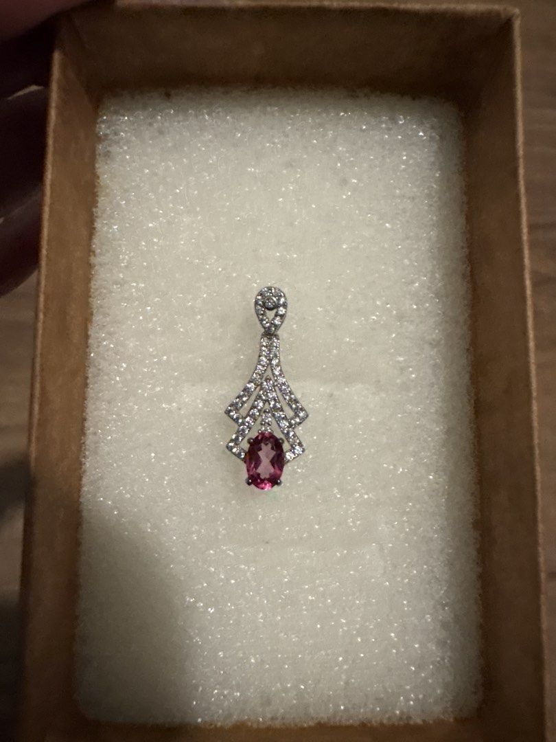 Silver Tone Pendant with Pink Gemstone and Crystals (Category: Necklaces) located in Paranaque City. Submitted by immedj (Listing ID 1456524476, Image 1). Description: - Elegant pendant with a central pink oval topaz gemstone. - Accented with sparkling clear crystals in a decorative s925 silver setting. - Top loop also features crystal detailing. - Beautiful and eye-catching design. - with certificate - bought from China - pay by gcash or bank tr