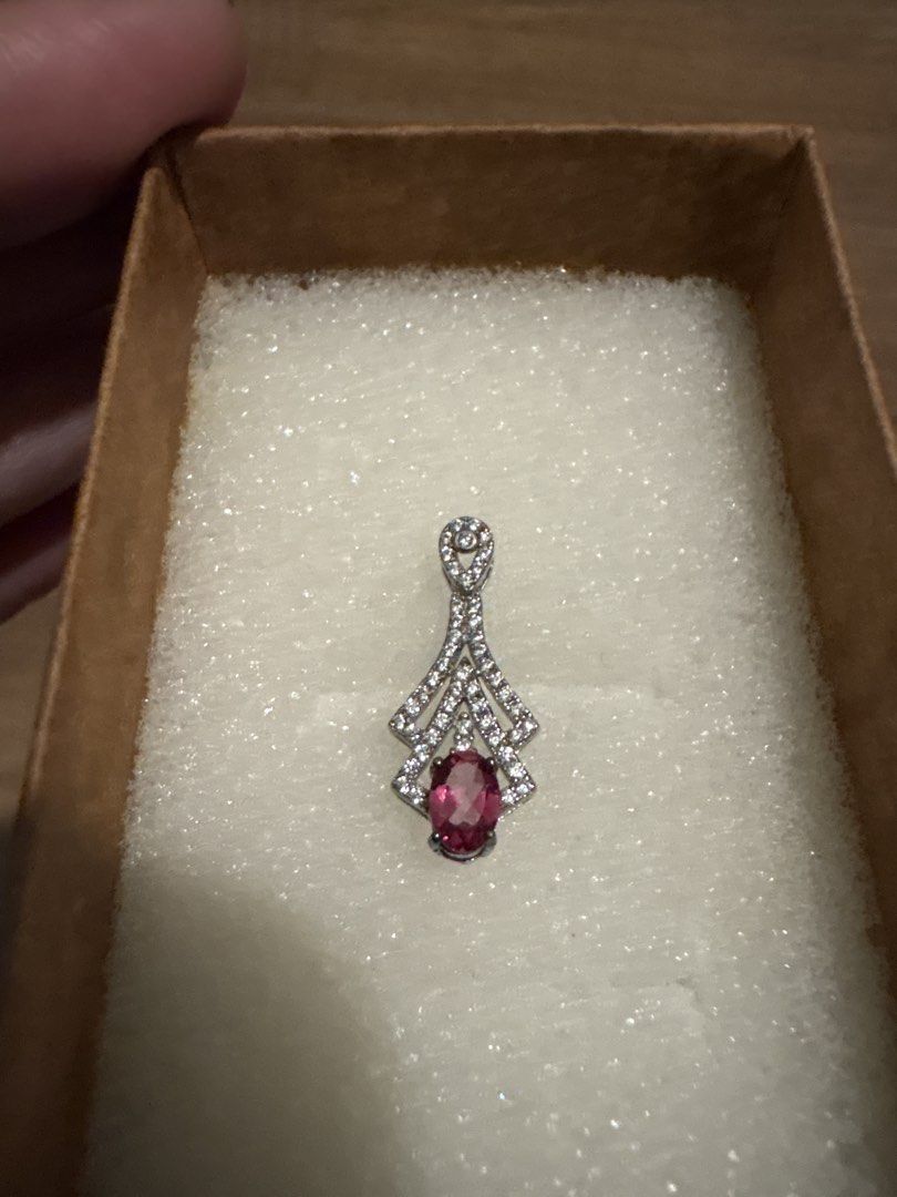 Silver Tone Pendant with Pink Gemstone and Crystals (Category: Necklaces) located in Paranaque City. Submitted by immedj (Listing ID 1456524476, Image 2). Description: - Elegant pendant with a central pink oval topaz gemstone. - Accented with sparkling clear crystals in a decorative s925 silver setting. - Top loop also features crystal detailing. - Beautiful and eye-catching design. - with certificate - bought from China - pay by gcash or bank tr