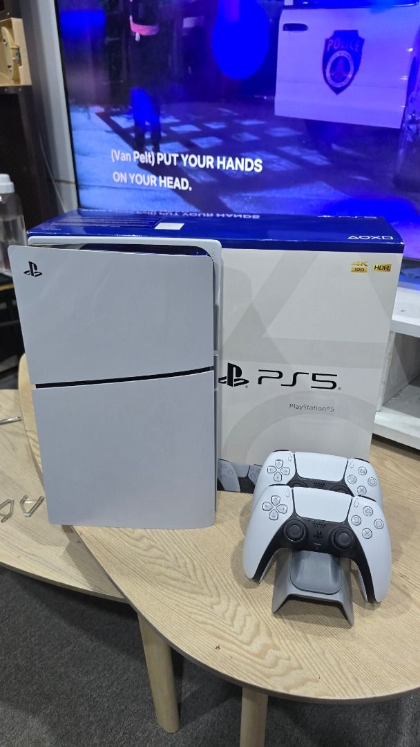 Sony PlayStation 5 Console with DualSense Controller (Category: PlayStation) located in Caloocan City. Submitted by vjaay (Listing ID 1456544722, Image 1). Description: [FOR SALE] PS5 Slim 1TB + Extra Controller & Dobe Dock! Selling my lightly used Sony PlayStation 5 Slim (1TB Disc Edition). Condition & Details: * Date of Purchase: 2025 * Overall Condition: 9.5/10 * System Status: Lates Firmware, Clean unit (Never opened, never repaired, NOT bann