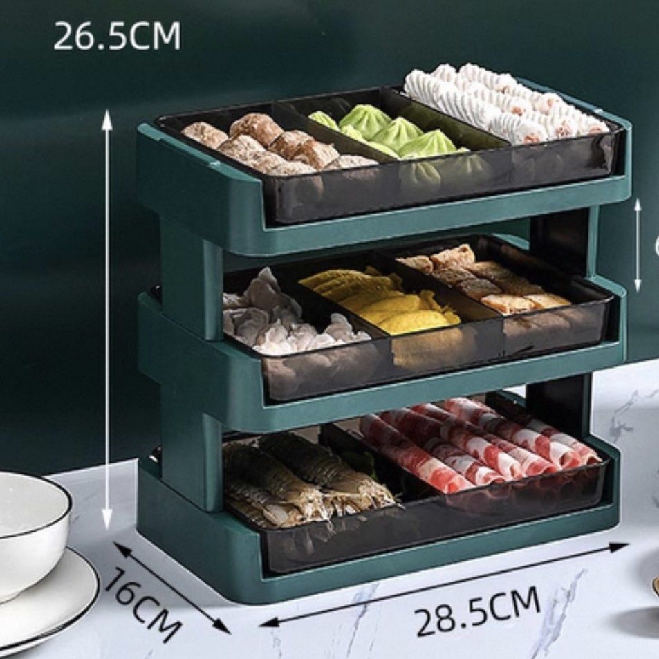Stackable Serving Tray (Category: Storage Boxes & Baskets) located in Singapore. Submitted by vantage.collective (Listing ID 1456603419, Image 2). Description: - 3-tier serving tray organizer - Perfect for hot pot, parties, and buffet-style meals - Multiple compartments on each tier to keep food separate - Trays slide out for easy access - Dimensions: Approx. 28.5cm (L) x 16cm (W) x 26.5cm (H) - Available in White.