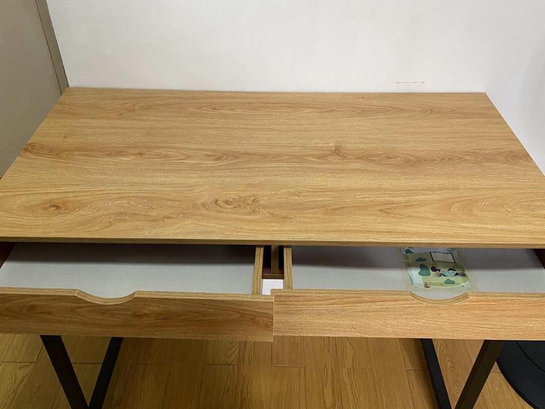 Study desk and mid-century chair (Category: Tables & Sets) located in Makati City. Submitted by http_myg_ (Listing ID 1456505773, Image 3). Description: Selling my study desk and mid-century chair w/ upholstery Bought both in 2022 Set: 1,500 Desk dimensions Height: 70.5 cm Length: 50.2 cm Width: 100 cm Flaws (see photos) -Right drawer does not totally close but still works -Right drawer underside has hole but temporarily covered with paper. May o