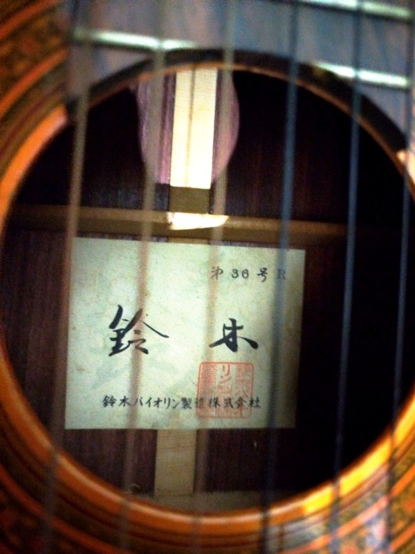 Suzuki Acoustic Guitar - Vintage Classical (Category: Musical Instruments) located in Quezon City. Submitted by fiercefish-ad37 (Listing ID 1456473203, Image 3). Description: - Vintage Suzuki Classical Acoustic Guitar beautiful sounds - Made in Japan - Serial Number: 36R -solid cedar top -rosewood Beautiful wood grain on back and sides -ebony fretboard and bridge - Minor scuffs from normal use - Tuners in good working order - Ideal for beginners 