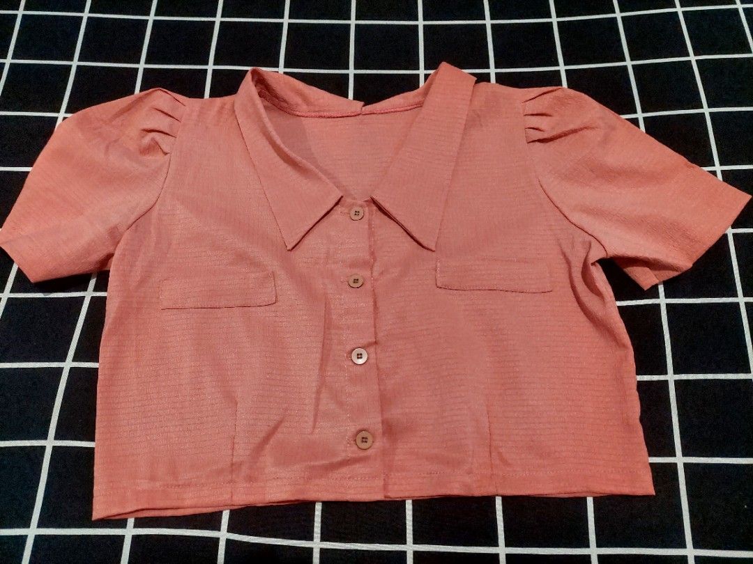 TAKE ALL Puff Sleeve Collared Cropped Blouse (Category: Blouses) located in Manila. Submitted by disabled_cloud (Listing ID 1456442107, Image 3). Description: - Cute cropped blouses - Puff sleeves and collared neckline - Button-up front - Two chest pockets - Versatile for dressing up or down - Easy to style with high-waisted bottoms - Fits small to medium frames - Last photo is for style inspo only.