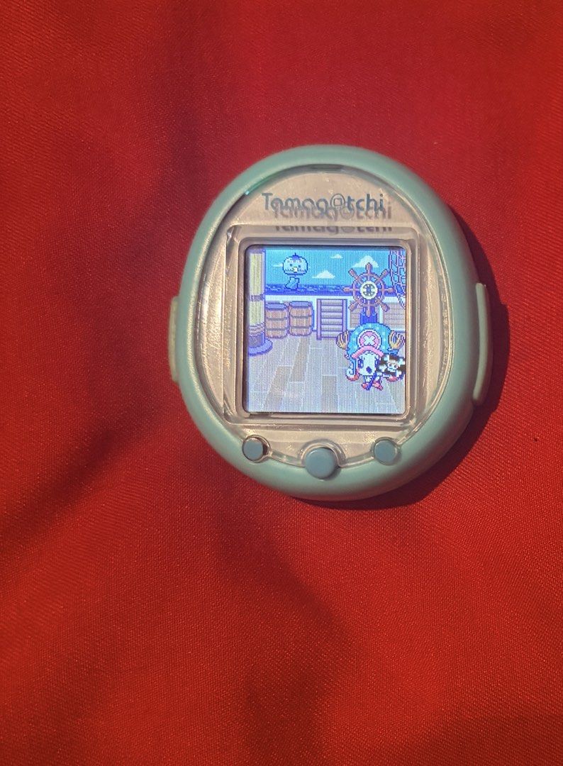 Tamagotchi Smart Mint (PLEASE READ DESCRIPTION FIRST) (Category: Interactive Toys) located in Cavite. Submitted by tamavee.jacs (Listing ID 1456515514, Image 1). Description: Please read description first Tamagotchi smart mint With one piece anime downloaded smartcard Japanese language Issue tanggal na yung cover sa charging port (see picture) nababalik naman may onting discoloration see pic Then sa pag charge may tamang pwesto ng charging siya. 