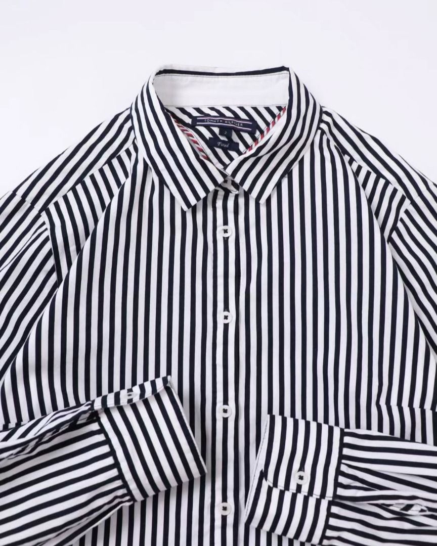 TH Button Down (Category: Tshirts & Polo Shirts ) located in Pasig City. Submitted by marcmesa (Listing ID 1456567446, Image 2). Description: Pinstripe Detail. Embroidered Logo. Classic Piece 🍸 AUTHENTIC A92 Condition: Excellent Size: Women's XS | L25" x W17".