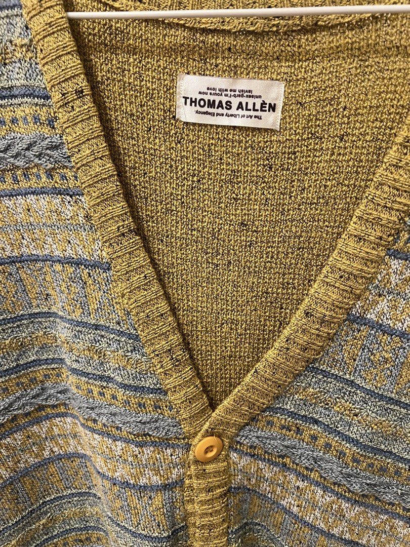 Thomas Allen Knitted Cardigan Vest (Category: Coats, Jackets and Outerwear) located in Las Pinas. Submitted by basicapparel_mnl (Listing ID 1456524483, Image 3). Description: - Thomas Allen knitted vest - Yellow and grey patterned knit - V-neck with button front - Sleeveless design - Ideal for layering over shirts or wearing on its own.