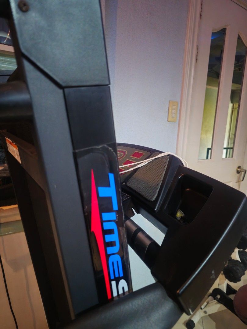 Time Sports Foldable Electric Treadmill (Category: Cardio & Fitness Machines) located in Manila. Submitted by cgjdeclutter (Listing ID 1456497849, Image 2). Description: Time Sports Foldable Electric Treadmill 🏃‍♂️ - Price: ₱8,000 — slightly negotiable - Brand: Time Sports (Original) - Type: Motorized / Electric Treadmill - Condition: Pre-loved / Second-hand, very good working condition - Seldom used and properly stored - Foldable and space-savi
