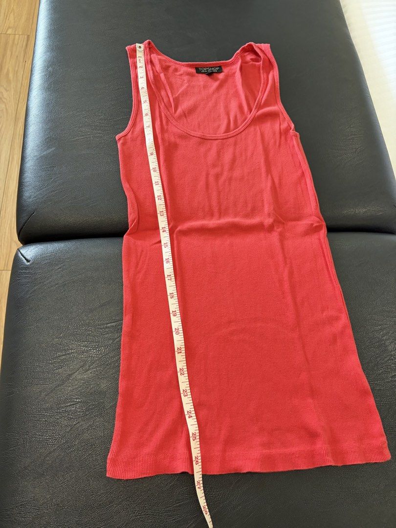 Topshop Red Knit Tank Top (Category: Blouses) located in Quezon City. Submitted by ciyellow (Listing ID 1456502077, Image 3). Description: Topshop Red Ribbed tank top.