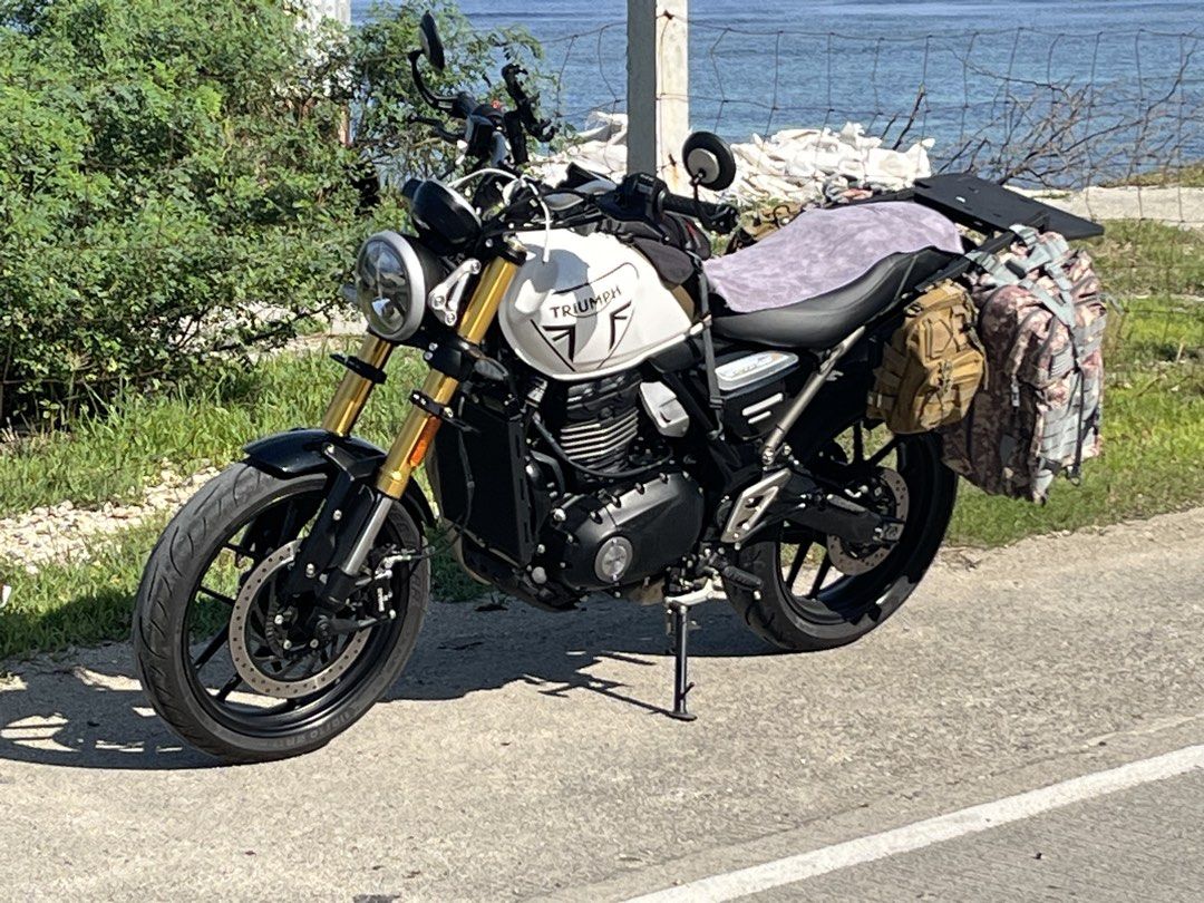 Triumph Speed 400 (Category: Motorbikes for Sale) located in Bacnotan. Submitted by vastgem.d0e409 (Listing ID 1456475065, Image 2). Description: Triumph Scrambler. White and black tank with gold forks. Comes with saddlebags and a rack on the back. Ready for your next adventure. Great for cruising or touring. Low mileage. Well maintained..