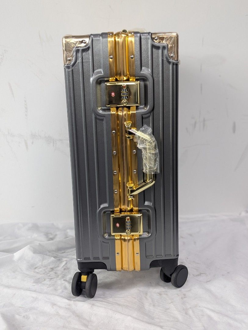 TSA-Lock Secured (Category: Luggage) located in Singapore. Submitted by general-merchandise (Listing ID 1456429421, Image 3). Description: - TSA-LOCK Secure, Stylish blue suitcase with gold accents - Spacious interior with multiple compartments - Features a handle and wheels for easy transport - with 1 replacement wheel and belt luggage - 21×15×10 - I'm a genuine seller and buyer, my old account I cannot open. I'm trustworthy / honesty, can searc