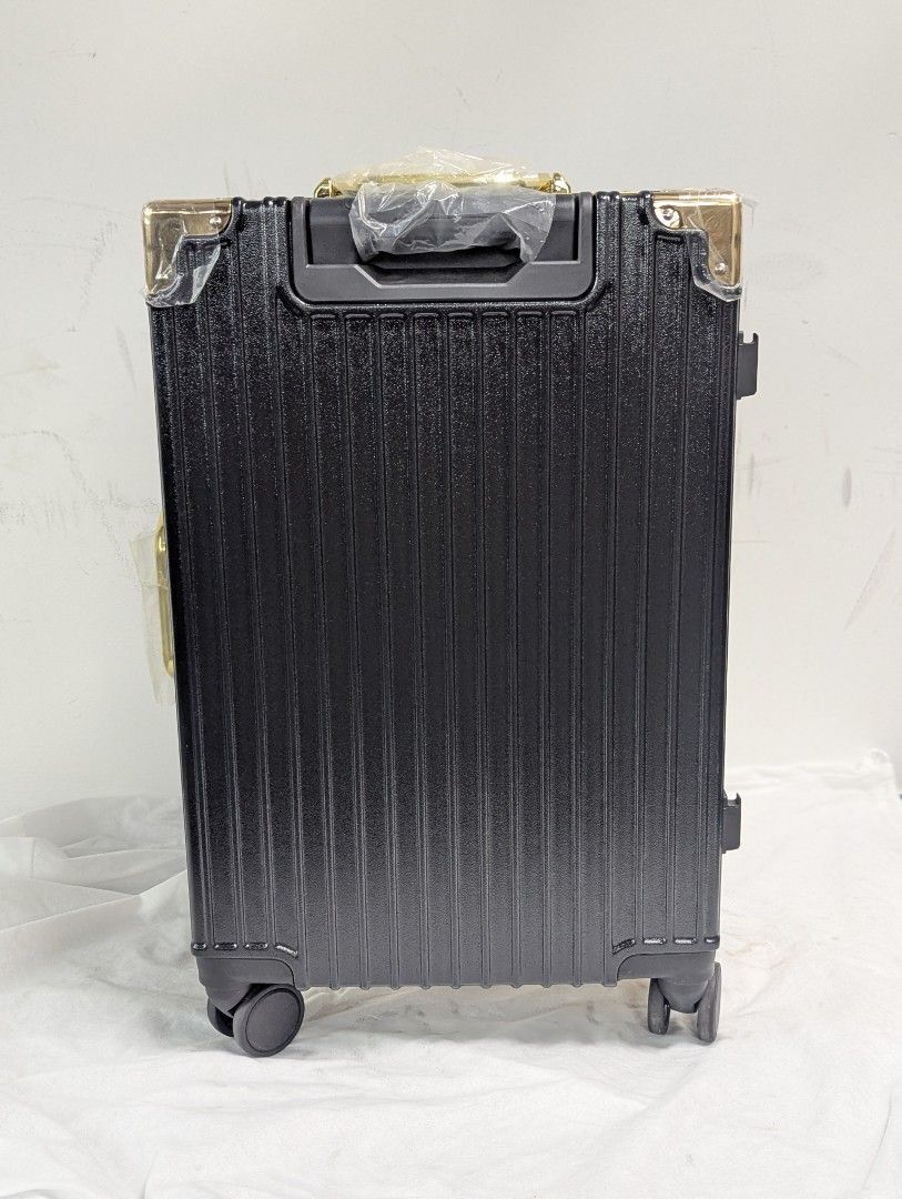 TSA-Lock Secured (Category: Luggage) located in Singapore. Submitted by general-merchandise (Listing ID 1456429607, Image 2). Description: - TSA-LOCK Secure, Stylish blue suitcase with gold accents - Spacious interior with multiple compartments - Features a handle and wheels for easy transport - with 1 replacement wheel and belt luggage - 21×15×10 - I'm a genuine seller and buyer, my old account I cannot open. I'm trustworthy / honesty, can searc