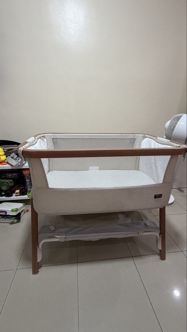Tutti Bambini CoZee Bedside Crib (Category: Cots & Cribs) located in Quezon City. Submitted by erinepanda (Listing ID 1456455358, Image 2). Description: Almost New Complete but no more box Will give 3 free mattress cover Negotiable .