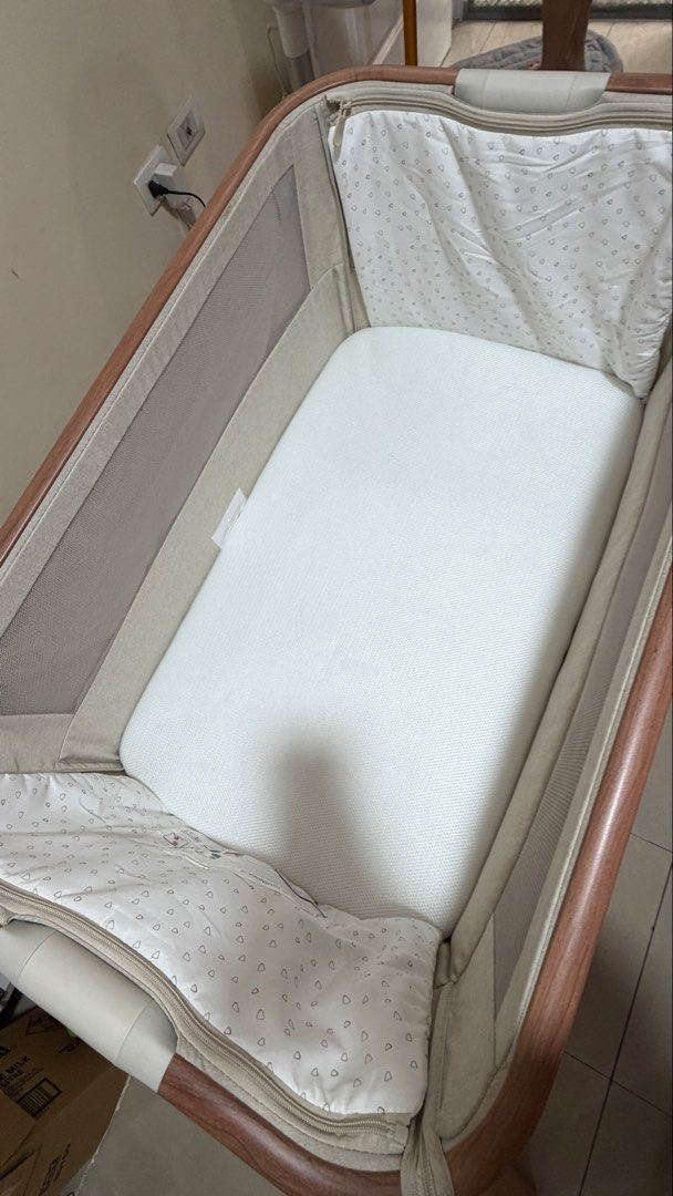Tutti Bambini CoZee Bedside Crib (Category: Cots & Cribs) located in Quezon City. Submitted by erinepanda (Listing ID 1456455358, Image 3). Description: Almost New Complete but no more box Will give 3 free mattress cover Negotiable .