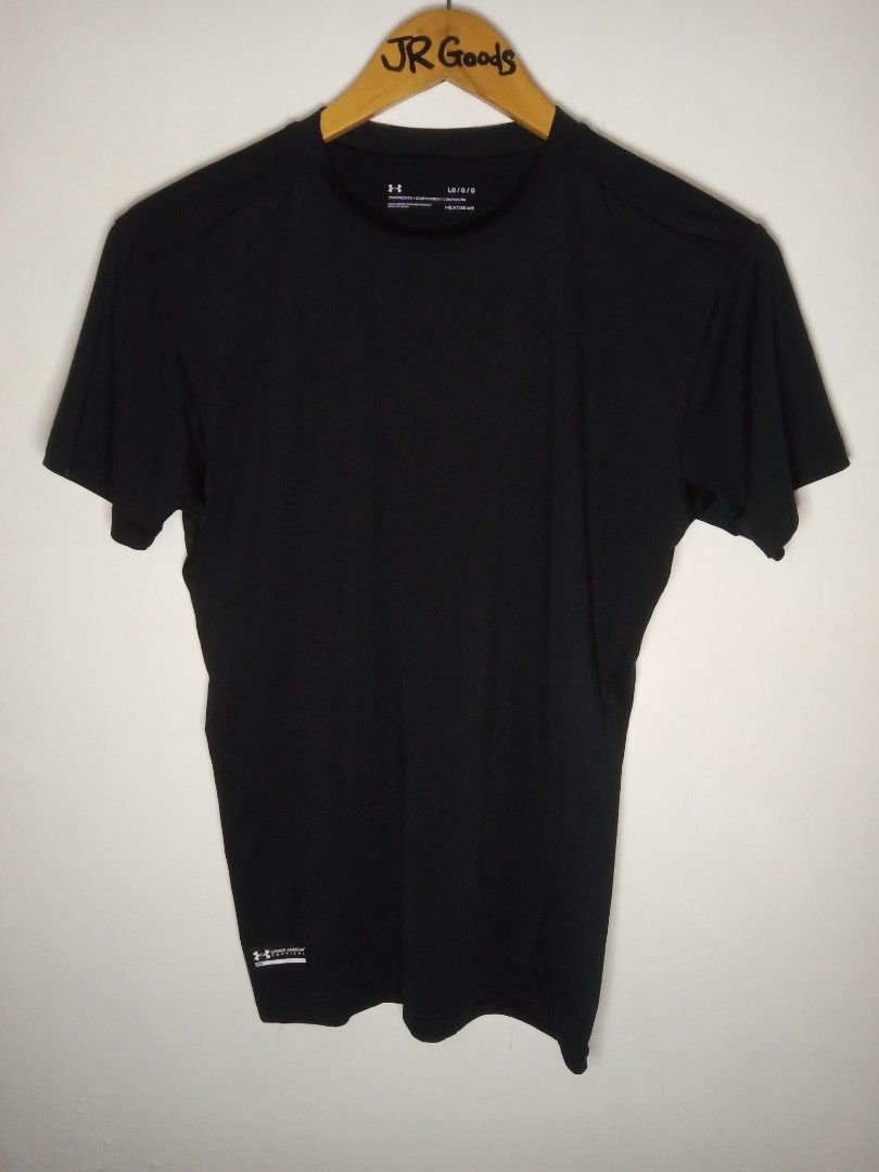 Under Armour Tactical HeatGear Compression Shirt (Category: Activewear) located in Tanay. Submitted by jrgoods (Listing ID 1456529141, Image 2). Description: - Bl Under Armour Tactical compression Shirt - HeatGear Compression Fit - Size: Large can fit medium men's Large to medium men's Strachable Good as new condition 550+ship Tanay Rizal location Shipping Nationwide - Ideal for training and sports - Comfortable and breathable material - Great fo