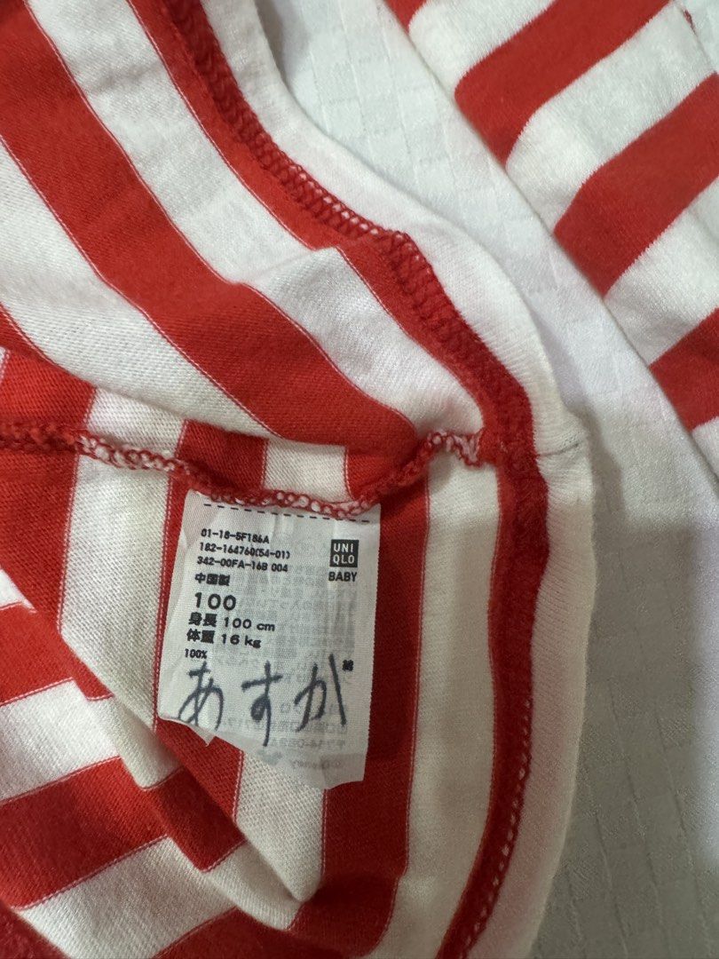 Uniqlo Baby Clothes Bundle (Category: Babies & Kids Fashion) located in Muntinlupa City. Submitted by readthedetails (Listing ID 1456549596, Image 2). Description: - Bundle of 4 baby tops - All size 100cm - Includes: - Uniqlo striped long-sleeve top - Blue and yellow checkered knit cardigan - Striped sailor-style top - Striped short-sleeve top with lion graphic - Great for everyday wear.