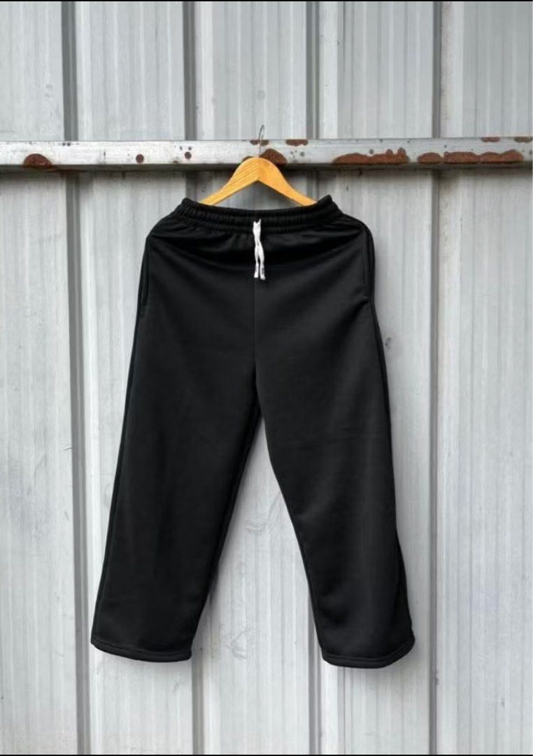 Unisex Casual Sweatpants - Grey & Black (Category: Joggers) located in Cavite. Submitted by randomyseller (Listing ID 1456488713, Image 2). Description: - Comfortable sweatpants for everyday wear. - Elastic waistband with drawstring for a snug fit. - Stylish wide leg design. - Available in versatile grey and black. - Ideal for lounging or casual outings. - Easy to pair with any top. BUNDLE shipped thru j&t.