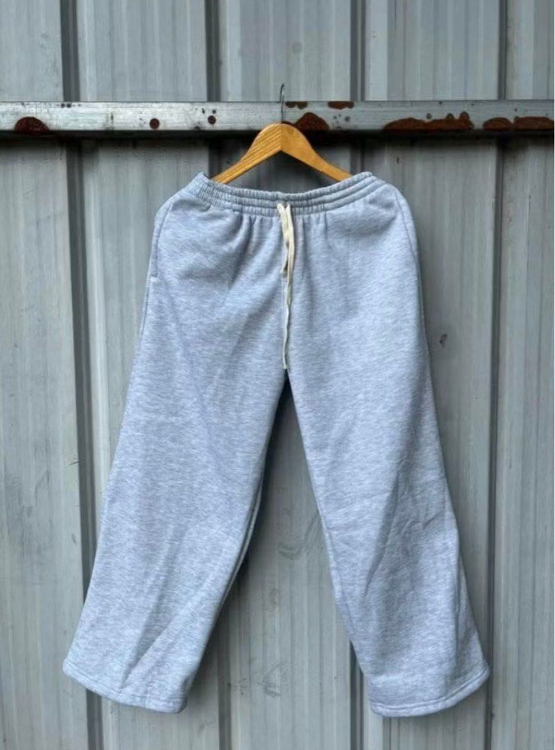 Unisex Casual Sweatpants - Grey & Black (Category: Joggers) located in Cavite. Submitted by randomyseller (Listing ID 1456488713, Image 1). Description: - Comfortable sweatpants for everyday wear. - Elastic waistband with drawstring for a snug fit. - Stylish wide leg design. - Available in versatile grey and black. - Ideal for lounging or casual outings. - Easy to pair with any top. BUNDLE shipped thru j&t.