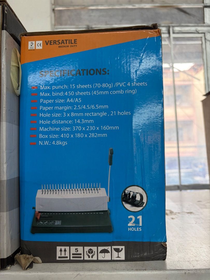 Versatile Medium Duty Comb Punch & Binding Machine (Category: Craft Supplies & Tools) located in Batac City. Submitted by vanillabuttercream (Listing ID 1456507245, Image 2). Description: - Punch up to 15 sheets (70-80g) or 4 PVC sheets at once. - Binds documents up to 450 sheets with a 45mm comb ring. - Supports A4 and A5 paper sizes. - Creates 21 rectangular holes (3x8mm). - Compact machine dimensions: 370 x 230 x 160mm. - Lightweight at only 4