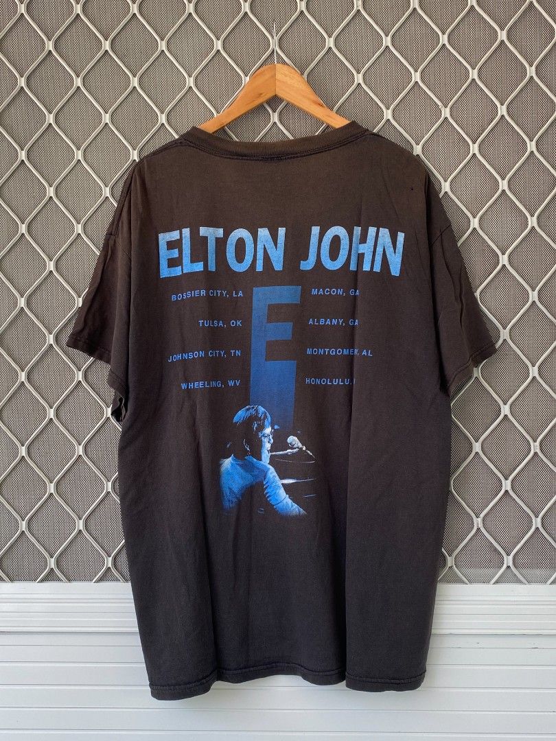 Vintage 90s Elton John Tour Tee (Trashed) (Category: Tshirts & Polo Shirts ) located in General Natividad. Submitted by jaygo02 (Listing ID 1456425481, Image 2). Description: fits XL 24 x 30.5 Color rate: 6/10 Issue/s: Uneven fade, pinholes, small holes on armpit & distressing on collar (check the last 6 pictures) 📍Nueva Ecija 📌washed 📌color may vary due to lighting 📌shipping via jnt express.