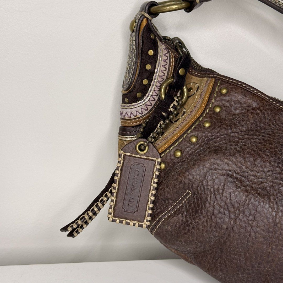 Vintage Coach Soho Hobo Bag (Category: Shoulder Bags) located in Manila. Submitted by saintjohnn (Listing ID 1456572349, Image 2). Description: Vintage Coach Soho Hobo Bag Excellent Condition Interior is in good condition Exterior is on good condition Crisp Zipper No issues Width: 36cm Length: 25cm Strap Drop: 23cm Ready to Ship Marikina Location.