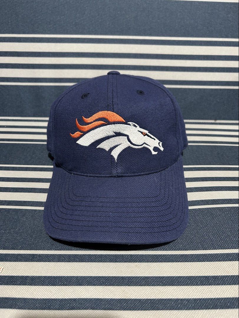 Vintage Denver Broncos Snapback Hat American Needle (Category: Caps & Hats) located in Maasin. Submitted by throwingreverse (Listing ID 1456514352, Image 1). Description: Adjustable plastic snap closure Team: Denver Broncos Color: Navy blue with orange/white logo and green underbrim Style: 6-panel snapback Color rate: 9.5/10 MOP: Gcash Location: SOUTHERN LEYTE .