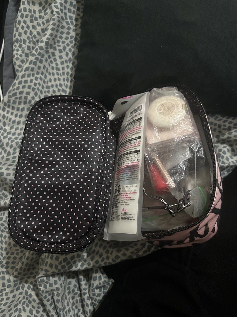 VS makeup pouch- travel case (Category: Makeup) located in Manila. Submitted by rarejap808 (Listing ID 1456532861, Image 3). Description: 100% Authentic, purchased directly from a Victoria’s Secret store in Dubai. Signature pink and black brushstroke print with the iconic “Victoria’s Secret” logo design. ✨ Details: • Like new condition — barely used • Clean interior, no stains or odor • Fully functional zipper • Great for makeup, toiletries, or a