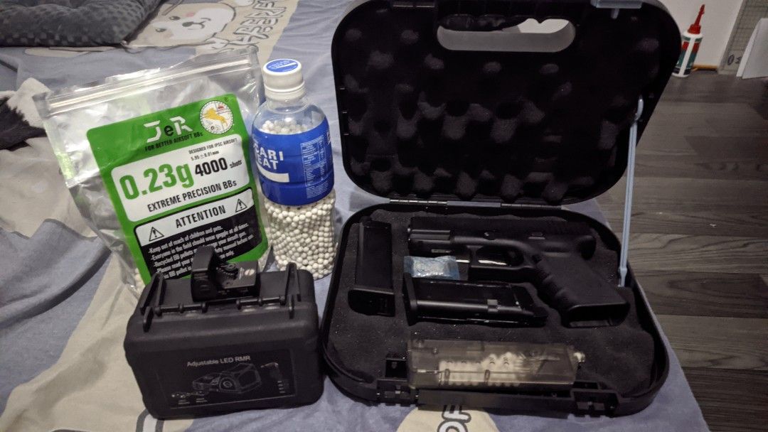 Airsoft Pistol WE Glock 19 Gen3 (Category: Action & Battle Toys) located in Manila. Submitted by kundol_seller (Listing ID 1456580173, Image 1). Description: WE glock 19 gen 3 Airsoft pistol toy with 2 mags, bbs, reloader, red dot, Glock hardcase - gas nalng kulang - Last year nabili - active use ng 6 months tas natambak na - me singaw lng isang mag dahil sa o-ring mura lng pagawa nyan - negotiable pa rfs palit hobby.
