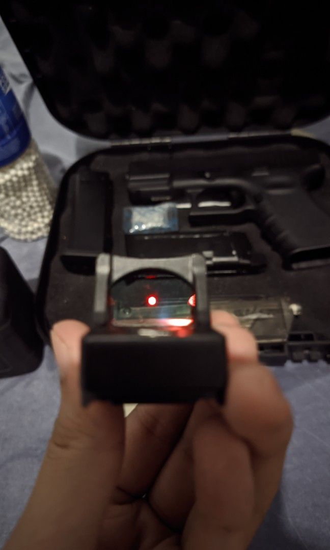 Airsoft Pistol WE Glock 19 Gen3 (Category: Action & Battle Toys) located in Manila. Submitted by kundol_seller (Listing ID 1456580173, Image 2). Description: WE glock 19 gen 3 Airsoft pistol toy with 2 mags, bbs, reloader, red dot, Glock hardcase - gas nalng kulang - Last year nabili - active use ng 6 months tas natambak na - me singaw lng isang mag dahil sa o-ring mura lng pagawa nyan - negotiable pa rfs palit hobby.