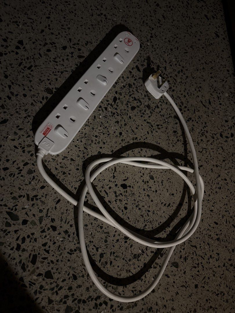 White 4-Gang Power Extension Socket for SINGAPORE (Category: Electrical, Adaptors & Sockets) located in Manila. Submitted by everythingwlove (Listing ID 1456583063, Image 1). Description: - White 4-gang power extension socket - Individual on/off switch for each socket - Equipped with a UK 3-pin plug - Approximately 1.5 meters long cable - Ideal for connecting multiple electronic devices simultaneously.