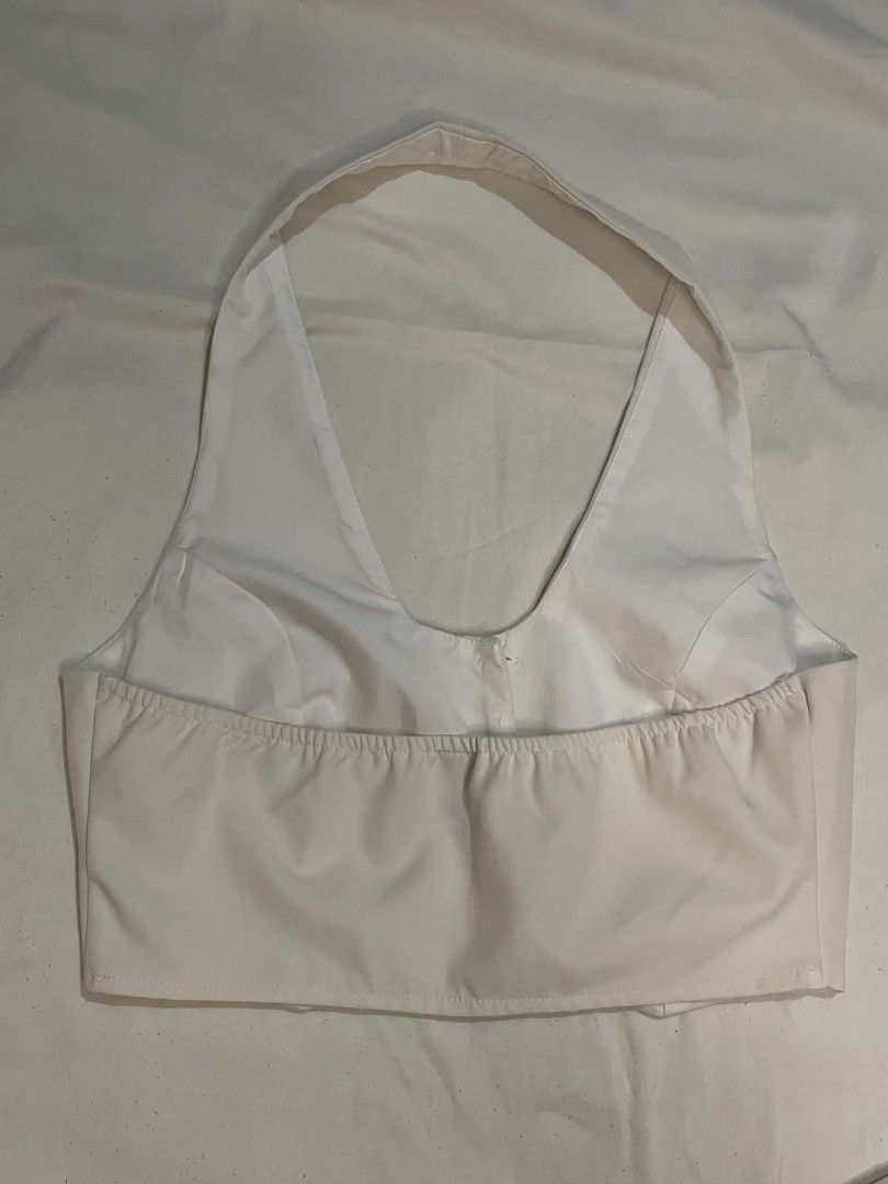 White Halter Neck Top and Mini Skirt Coords (Category: Sets or Coordinates) located in Binan City. Submitted by declutterbyjwy (Listing ID 1456498008, Image 3). Description: top (bust: 34-35" | waist: 26-27 | length: 16.5") skirt (waist: 24-25 | length: 14") - good as new, never used - versatile: can be worn together or separately - Last price posted!.