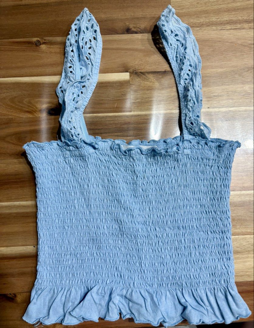 Woman Top Garterized adjustable top can fit Small-Medium (Category: Blouses) located in Manila. Submitted by cutesybysdc (Listing ID 1456440742, Image 2). Description: Garterized adjustable top can fit Small-Medium Still in great condition The fabric and color in actual doesn’t look and feel cheap Actual sizing in the photo .
