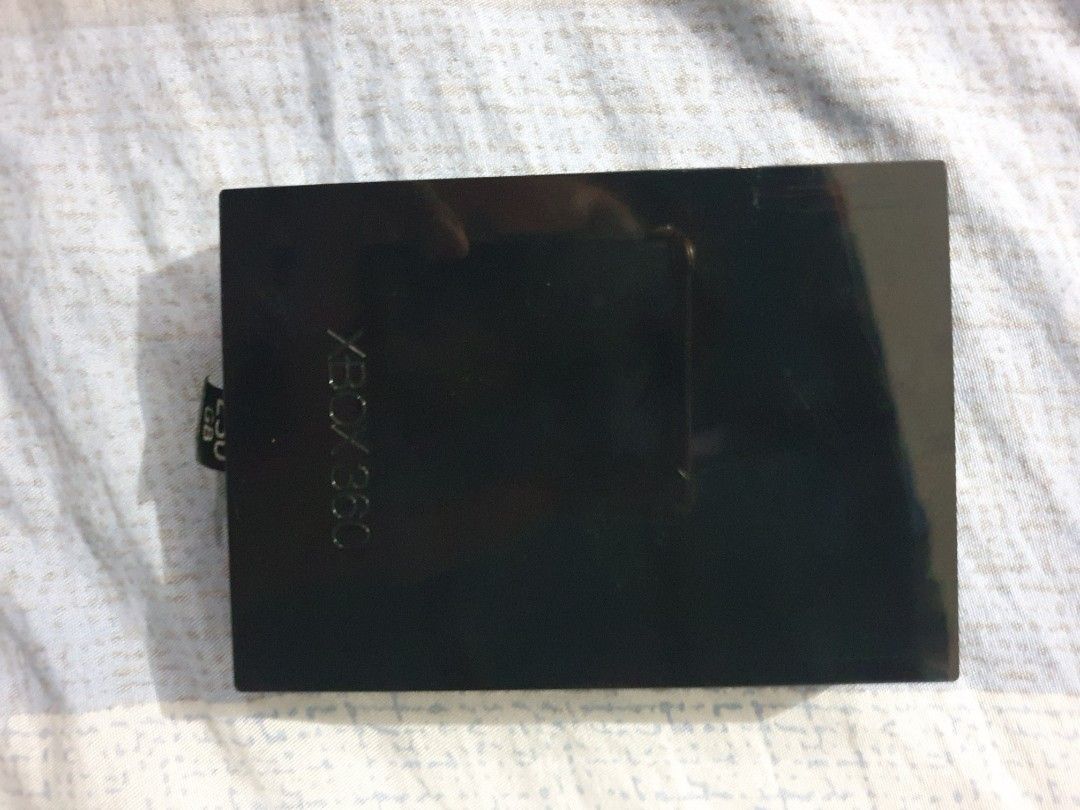 Xbox 360 S 250GB Hard Drive (Category: Xbox) located in Manila. Submitted by paustria1813723 (Listing ID 1456544093, Image 3). Description: - Original Xbox 360 S Hard Drive - 250GB Storage Capacity - Model 1451 - Compatible with Xbox 360 S consoles - Made in Thailand - Ideal for expanding game and download storage Negotiable.