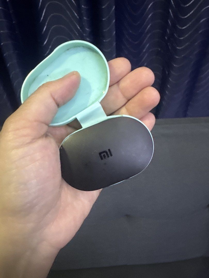 Xiaomi Mi True Wireless Earbuds (Category: Earphones) located in Valenzuela. Submitted by arizanatividad (Listing ID 1456534920, Image 1). Description: - Xiaomi Mi True Wireless Earbuds - Color: Black earbuds - Includes charging case - Case color: Light Blue - Ideal for music and calls - Great for on-the-go use - Compact and portable design.