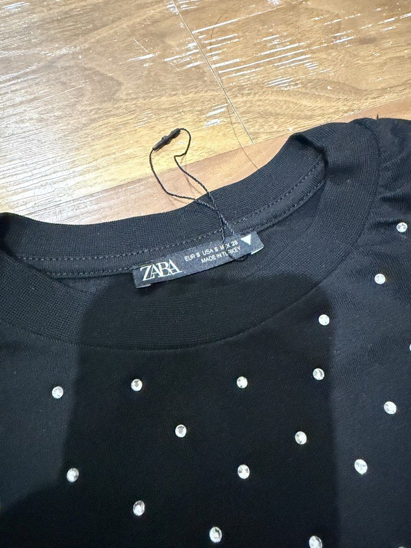 Zara Black Sequin Embellished T-Shirt (Category: Shirts) located in Caloocan City. Submitted by MSCloset_ (Listing ID 1456428822, Image 2). Description: - Zara Black T-Shirt - All-over sequin embellishments - Crew neck, short sleeves - Made in Turkey - Size S - Versatile: dress up or down.