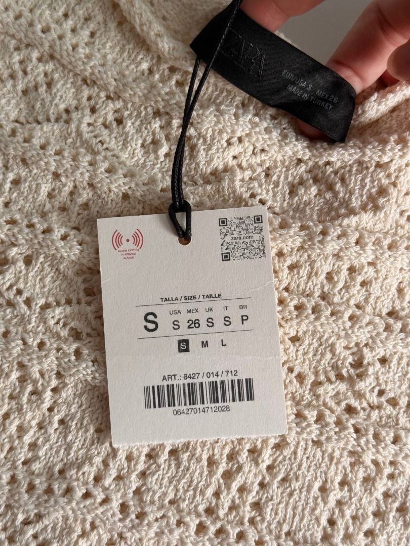 Zara Cream Crochet Top (Size S) (Category: Blouses) located in San Juan City. Submitted by maxiepie (Listing ID 1456573087, Image 3). Description: Brand new and selling for 50% off. Comes with original tag. Features: - Retails for approximately $44 or P2,700 - Crocheted body with puff sleeves - Can be dressed up or down - Perfect for summery, casual, boho, beach, and city looks - Size S RFS: Gift, won't use.